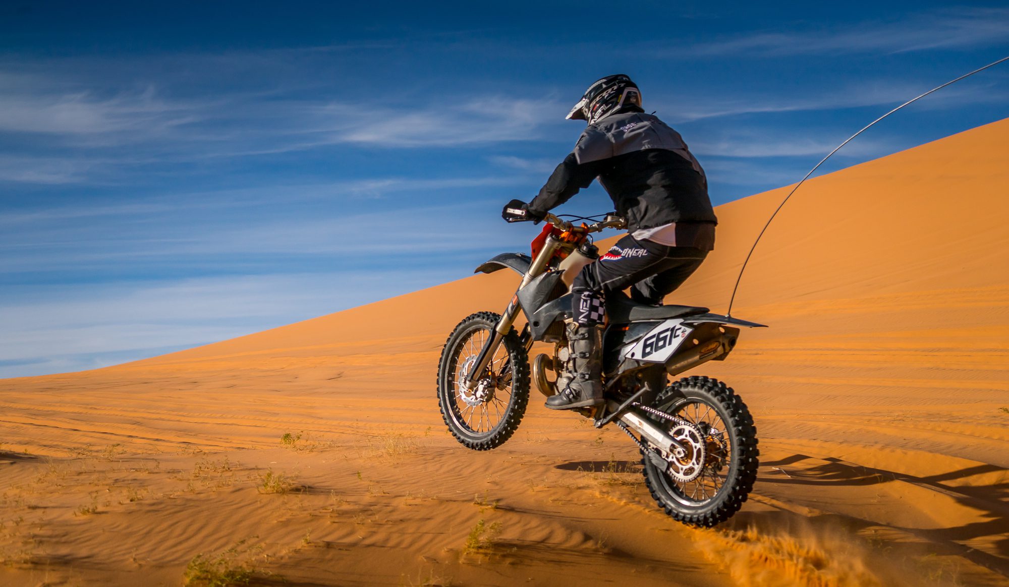Motorcycle rider at Utah's Coral Pink Sand Dunes